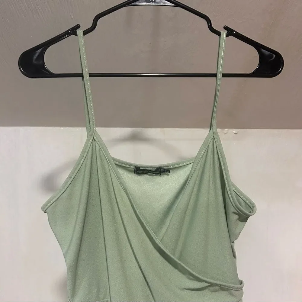 PrettyLittleThing Sage Green Crepe Strappy Wrap Romper